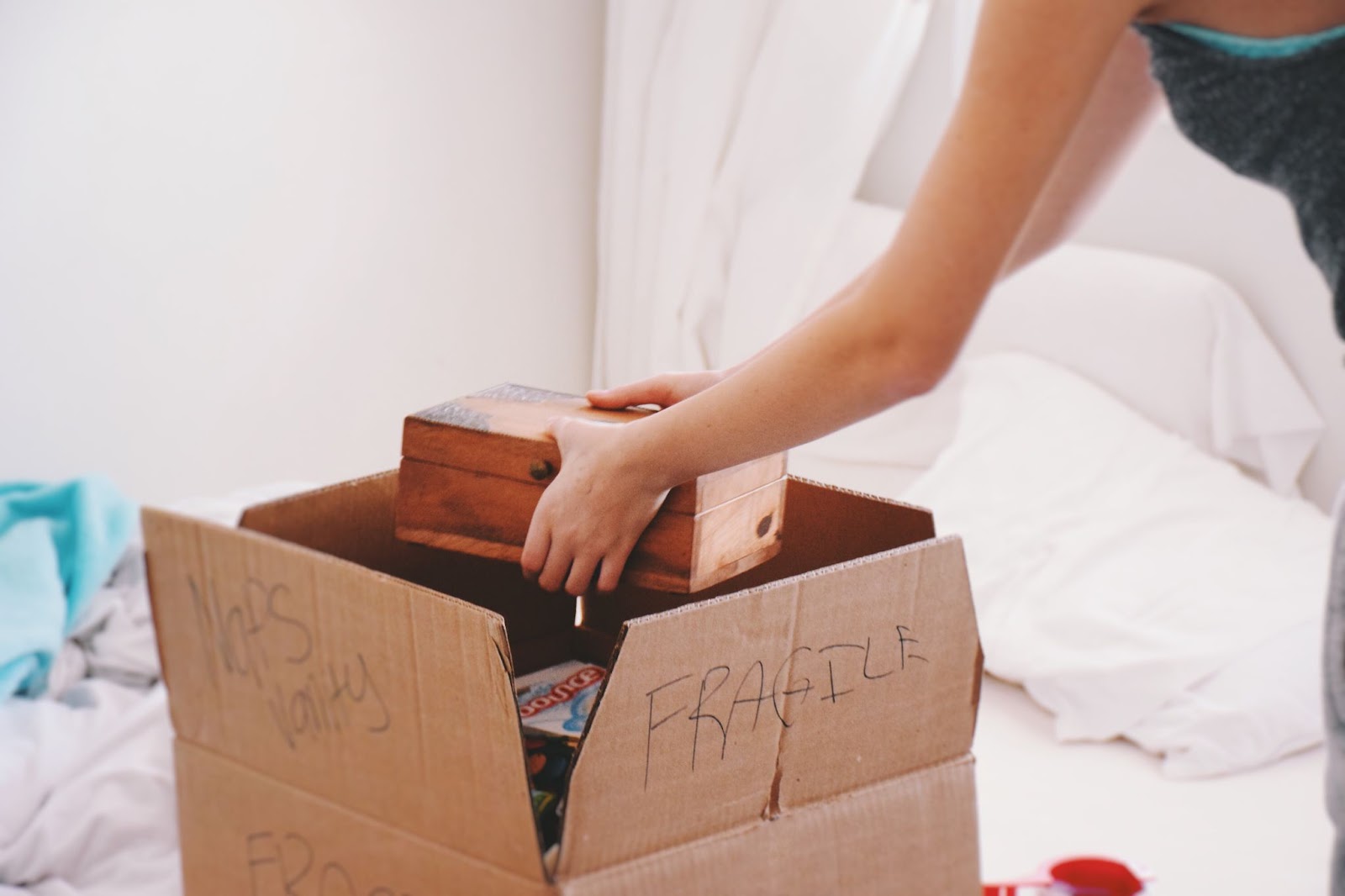 wooden box placed inside cardboard box